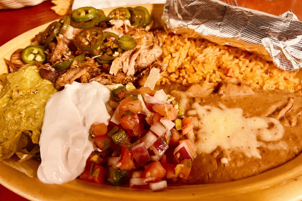 Carnitas With Refried Beans, Rice, and Avocado Salad